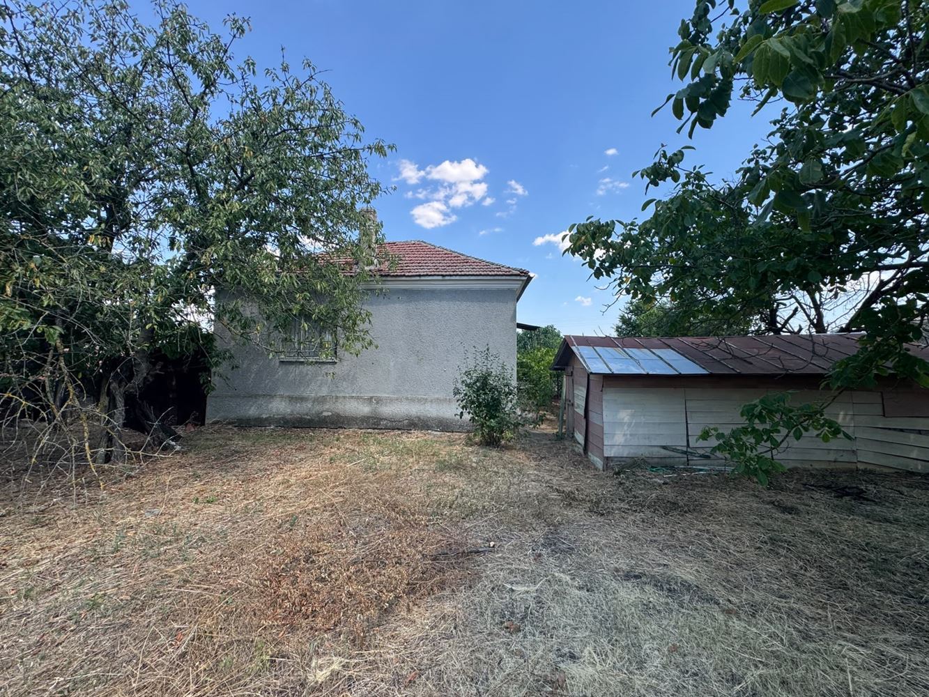 One-Storey House with Large Yard and Garage in Smolnik Village, Burgas Region – Peace and Opportunity for a New Home