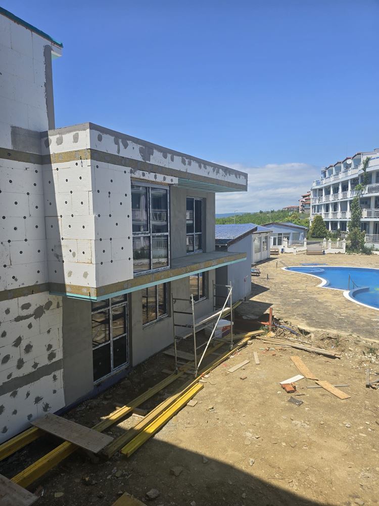 Luxury spacious house with panoramic terraces and a private garden in a modern complex near the sea