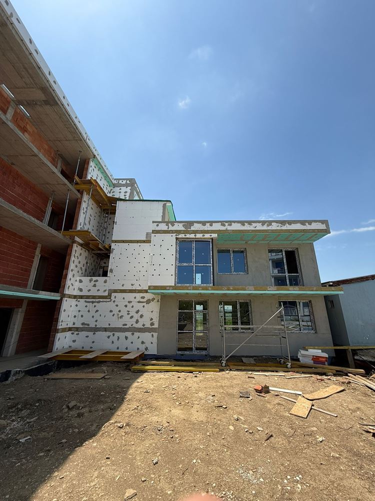 Luxury spacious house with panoramic terraces and a private garden in a modern complex near the sea