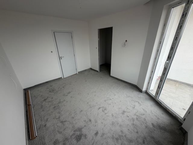 Three-storey terraced house in Banevo – modern construction, yard and two parking spaces